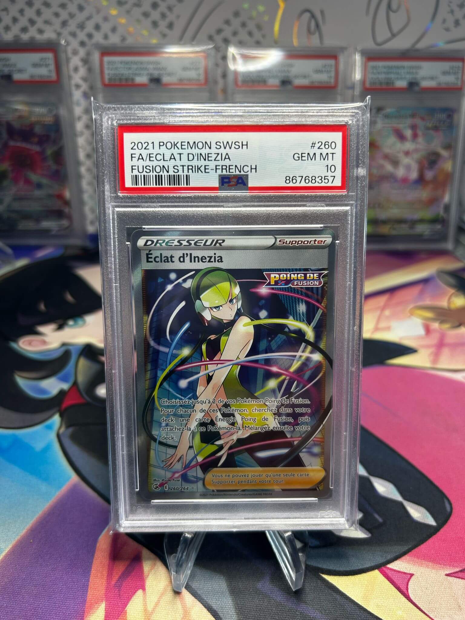 Eclat d’Inezia FR PSA 10 260/264 EB08 – Carte Pokemon